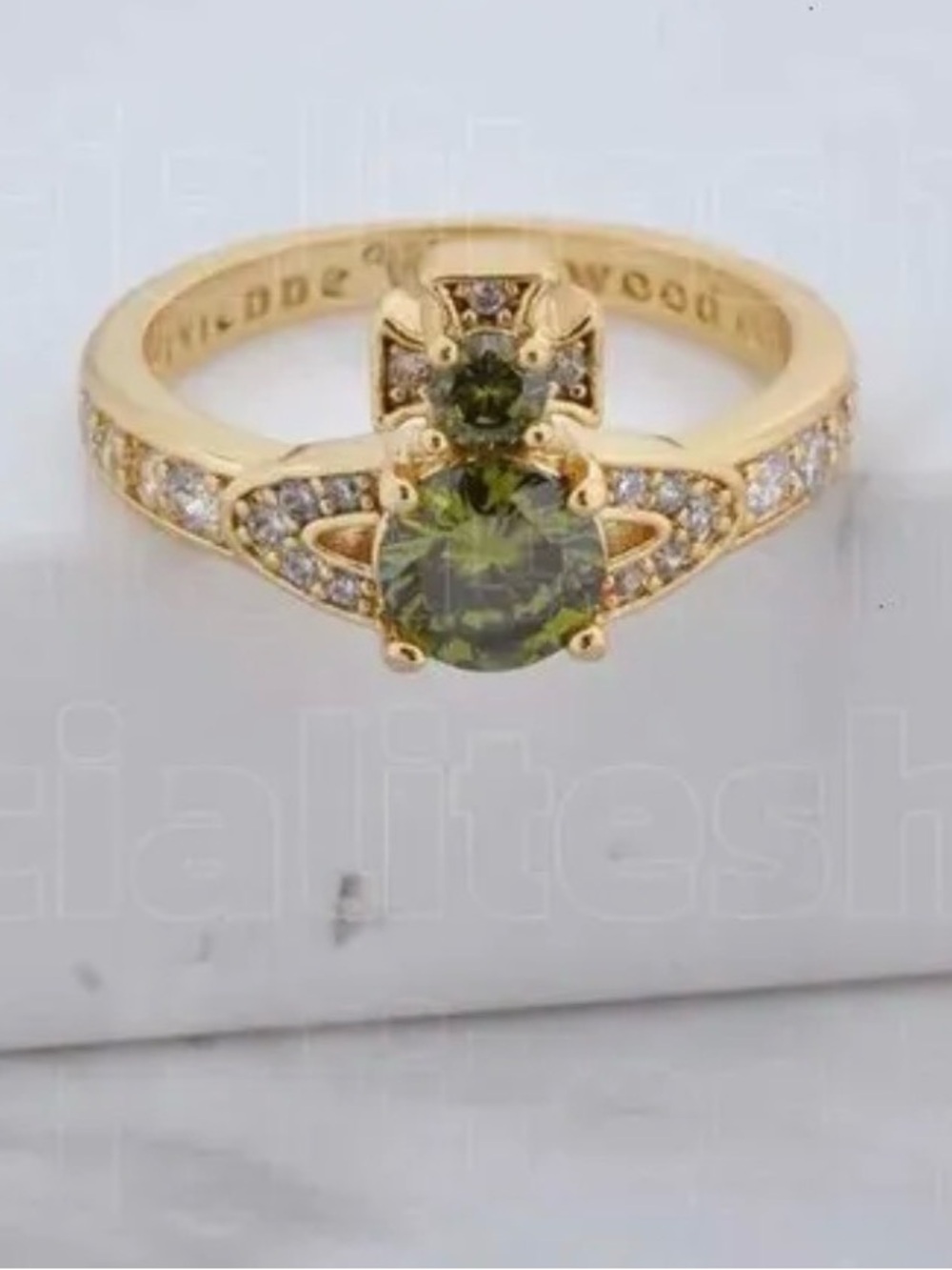 Vivienne Westwood Gold Ring with Green Center Stones